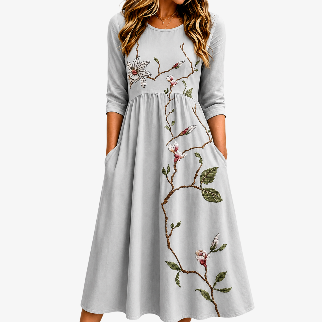 Midikleid mit Taschen und silbernen Blumenmotiven
