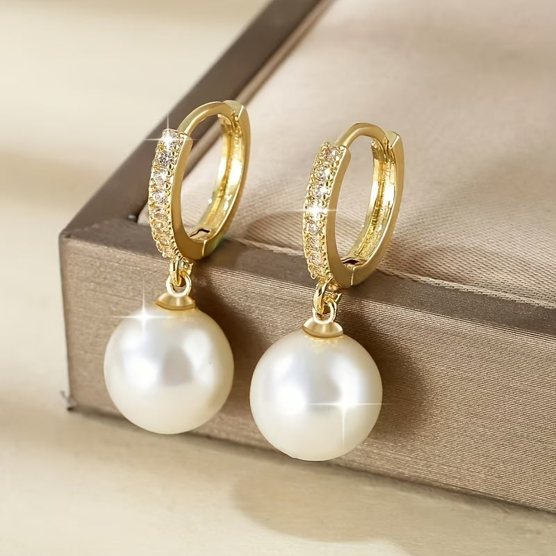 Die modernen Perlen-Ohrhänger